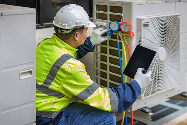 Professional Hvac technician working in New Douglas, IL